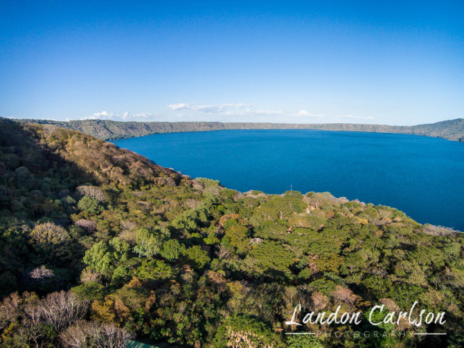 Beautiful Blue Lake View with Trees Looking into the Active Volcano Crater